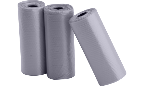 Tres rollos de 15 bolsas grises para perros, resistentes e impermeables, ideales para recoger desechos en paseos.